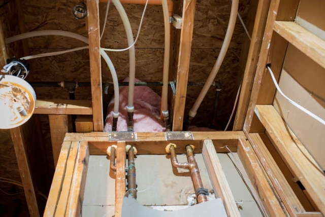 We needed to redesign and rebuild the wall to better protect the wine cellar against moisture and outside forces by installing foam insulation and vapor barrier.