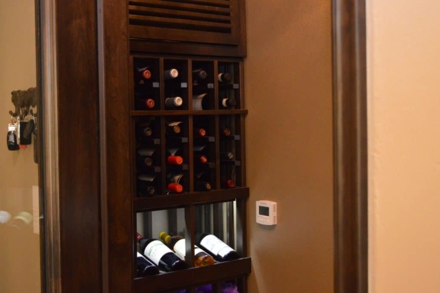 This Corona, CA wine cellar's wooden racking system, with their sleek, simple and contemporary build and design, are perfect for presenting your wines in an eye-catching way.