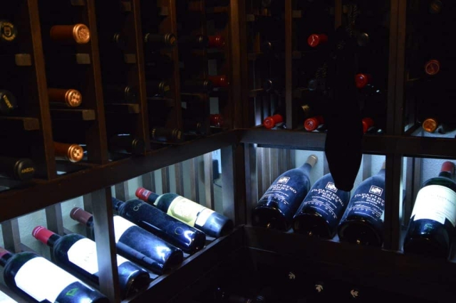 The LED rope lighting on the wine racks adds comfort along with a quiet refrigeration unit.